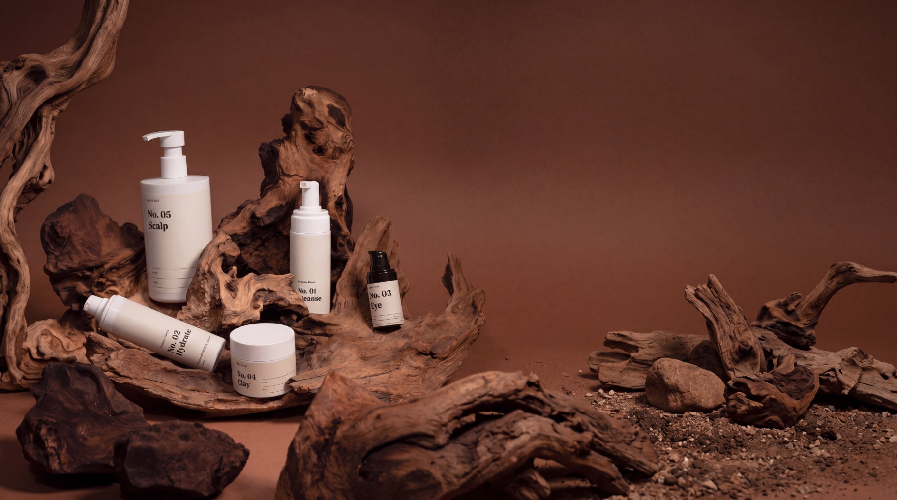 BHLML products arranged on driftwood